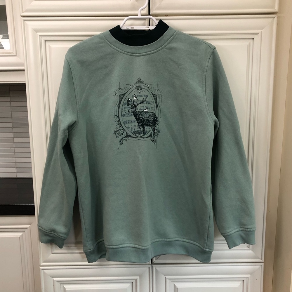 Northern Reflections Green Sweatshirt with Deer Design
